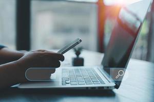 Search Engine Optimization SEO, data searching technology. business hands typing on smart phone keyboard to search the information via internet web browser. Browsing social networking interface. photo
