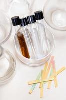 test tubes with liquids and used litmus papers photo