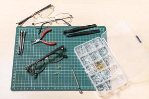 tools for replacement of eyeglass nose pads photo