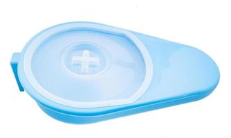 closed blue plastic fracture bedpan isolated photo