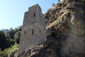 Dagestan.Russia.September 13, 2022.Traditional dagestan defensive tower in the mountains in the village of Gimry Untsukul district. photo