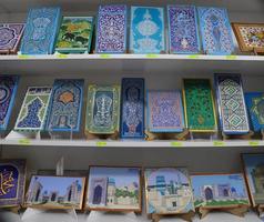 Samarkand. Uzbekistan. April 07, 2022.Souvenir shop. Tiles painted in traditional Uzbek patterns. photo