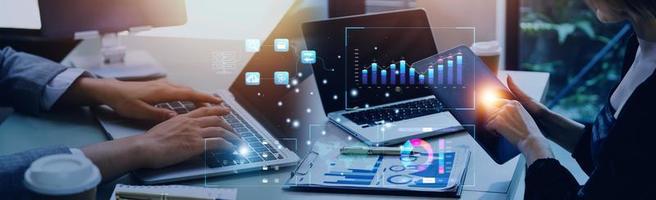 Analyst working with Business Analytics and Data Management System on computer, make a report with KPI and metrics connected to database. Corporate strategy for finance, operations, sales, marketing. photo