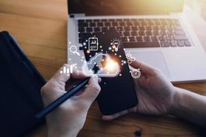 man use Laptop with cloud computing diagram show on hand. Cloud technology. Data storage. Networking and internet service concept. photo