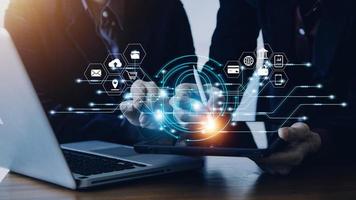 Cybersecurity and privacy concepts to protect data. Lock icon and internet network security technology. Businessman protecting personal data on smart phone with virtual screen interfaces. photo