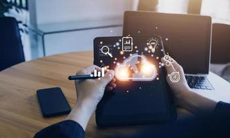 man use Laptop with cloud computing diagram show on hand. Cloud technology. Data storage. Networking and internet service concept. photo