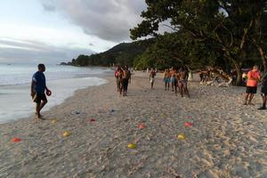 MAHE, SEYCHELLES - AUGUST 13 2019 - Local soccer team training on the beach photo