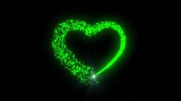 Partikelherzspur. Herz aus herzförmigen Partikeln. leuchtende Partikelspur, die sich auf schwarzem Hintergrund bewegt. Partikelherzspur mit glitzernden, leuchtenden Hörpartikeln auf schwarzem Hintergrund, magisches Herz s video