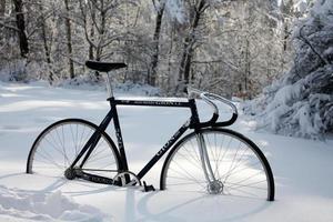 Close up bicycle stucking in snow concept photo