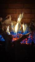 Gas Burning Fireplace Blue and Orange Flame Portrait video