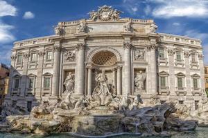 Trevi Fountain in Rome on sunny day photo