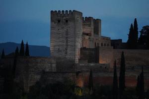 Alhambra fortress palace in Granada Spain at sunset photo