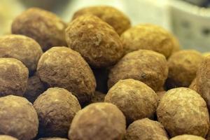 chocolate truffles isolated in candy shop in florence photo