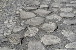 antigua calzada romana de piedra en roma foto