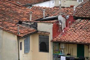 florence italy old houses roofs detail photo