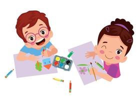 kids cutting colored paper with scissors and painting vector