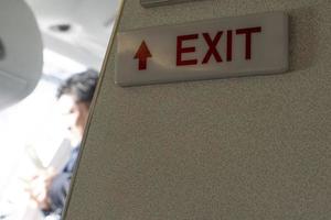 exit sign on airplane photo