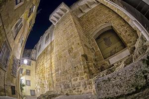 Lisbon city walls at night cityscape photo