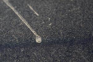 Desert sand dirty car glass window photo