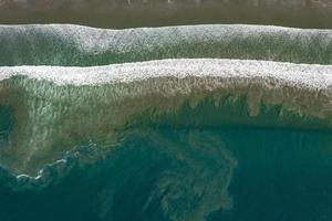 pacific ocean waves in Scorpion Bay San Juanico Baja California Sur Mexico aerial panorama photo