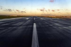 paris airport landing track at sunrise photo