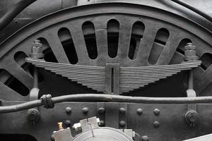 old steam train wheels detail photo