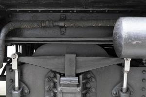 old steam train wheels detail photo