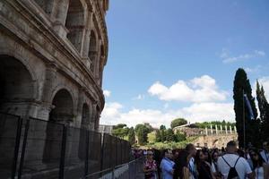 ROME, ITALY - JUNE 10 2018 -  Tourists taking pictures and selfies at colosseo photo