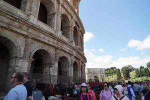 ROME, ITALY - JUNE 10 2018 -  Tourists taking pictures and selfies at colosseo photo