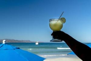 tequila sunrise glass in a beach bar in Mexico Baja california sur photo