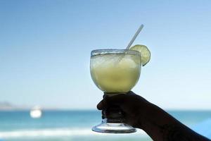 tequila sunrise glass in a beach bar in Mexico Baja california sur photo