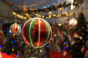 christmas tree decorations at street market photo