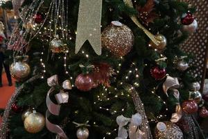 christmas tree decorations at street market photo