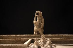 Valencia Silk Exchange Market building Lonja de la Seda gargoyles at night photo