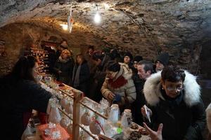 RANGO, ITALY - DECEMBER 8, 2017 - People at traditional christmas market photo