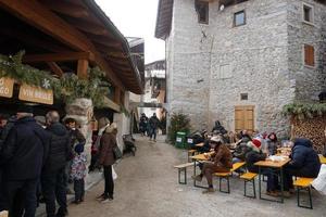 RANGO, ITALY - DECEMBER 8, 2017 - People at traditional christmas market photo