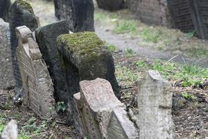 PRAGUE, CZECH REPUBLIC - JULY 17 2019 - jewish old cemetery in prague photo