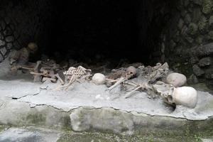 Ercolano Herculaneum fugitives skeletons on the beach photo