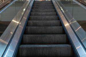 Metro escalator subway with no people photo