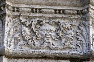 VENICE, ITALY - SEPTEMBER 15 2019 - doge ducal palace capital of column wayside sculpture detail photo