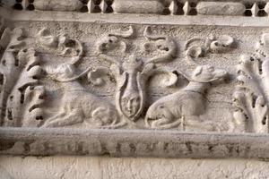 VENICE, ITALY - SEPTEMBER 15 2019 - doge ducal palace capital of column wayside sculpture detail photo