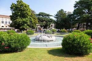 Verona, Italy - the Fountain of Alps, located in Piazza Bra garden. photo