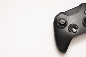 game controller on white background. Black game controller isolated background. photo