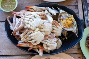 close up Fresh Streamed crab is ready to eat on the local restaurant  table. photo