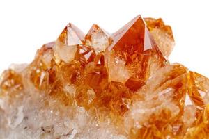 Macro mineral stone Citrine in rock in crystals on a white background photo