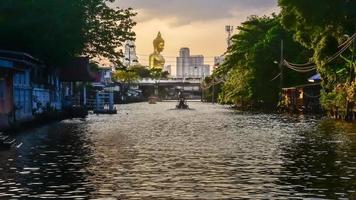 landscape of big buddha in the city large Buddha statue  in Bangkok Wat Pak Nam Phasi Charoen Thailand photo