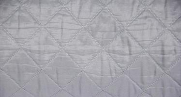 Simple gray cloth fabric pattern textured background with empty copy space for wallpaper and texts photo