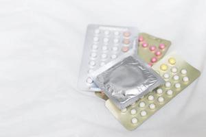 Condoms and birth control pills photo