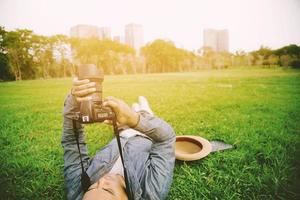 A man using a camera photo