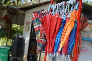 Colorful umbrellas for tourists to use from the sun. photo